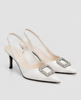 Ivory slingback heels with rectangular crystal-look buckle detailing