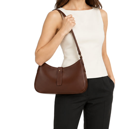 Chocolate Crescent Shoulder Bag – carried by model, close studio view