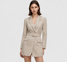 Model wearing a sand-colored belted blazer mini dress