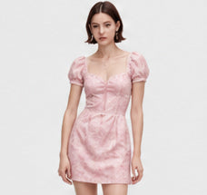 Blush pink puff-sleeve mini dress on a model