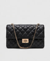 Black quilted shoulder bag with a gold-tone chain strap