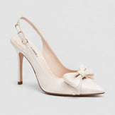 Ivory pointed-toe slingback heels with a decorative bow